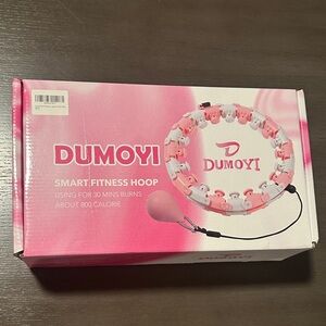 Dumoyi fitness hoop in pink and white.